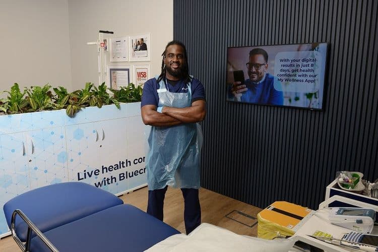 Bluecrest employee standing in one of the assessment rooms.